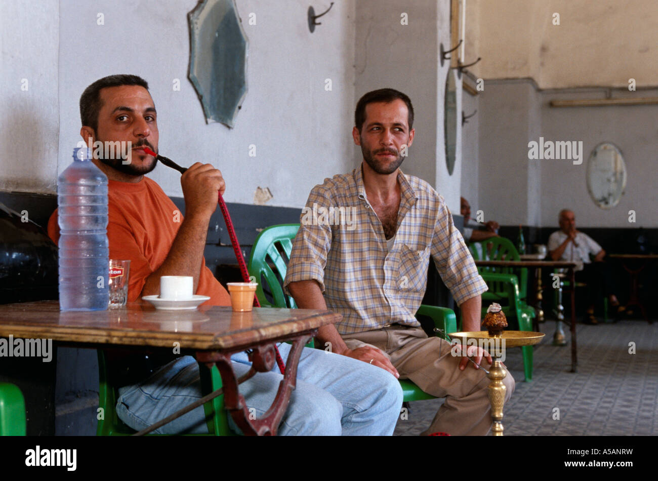 Men smoking hookah at a restaurant in Saida Lebanon Stock Photo Alamy