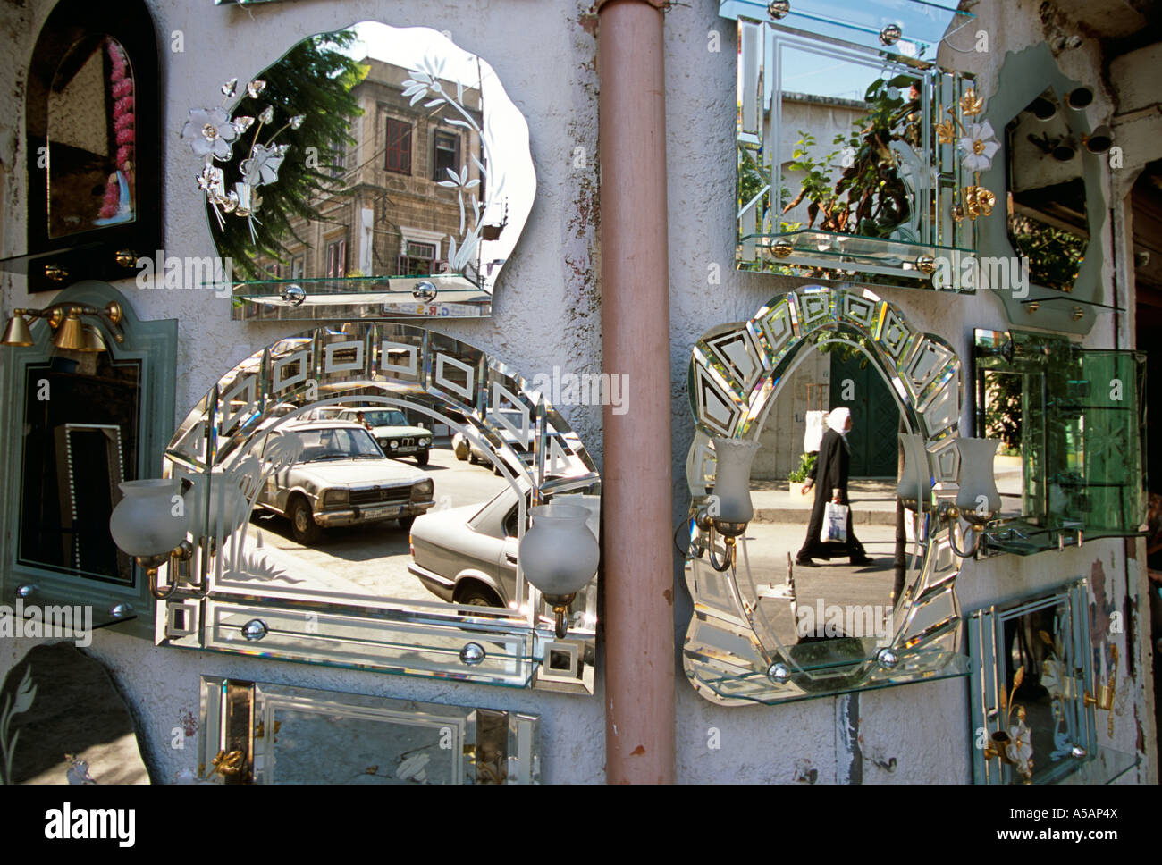 Street scene reflected in shop mirrors in Tripoli Lebanon Stock Photo