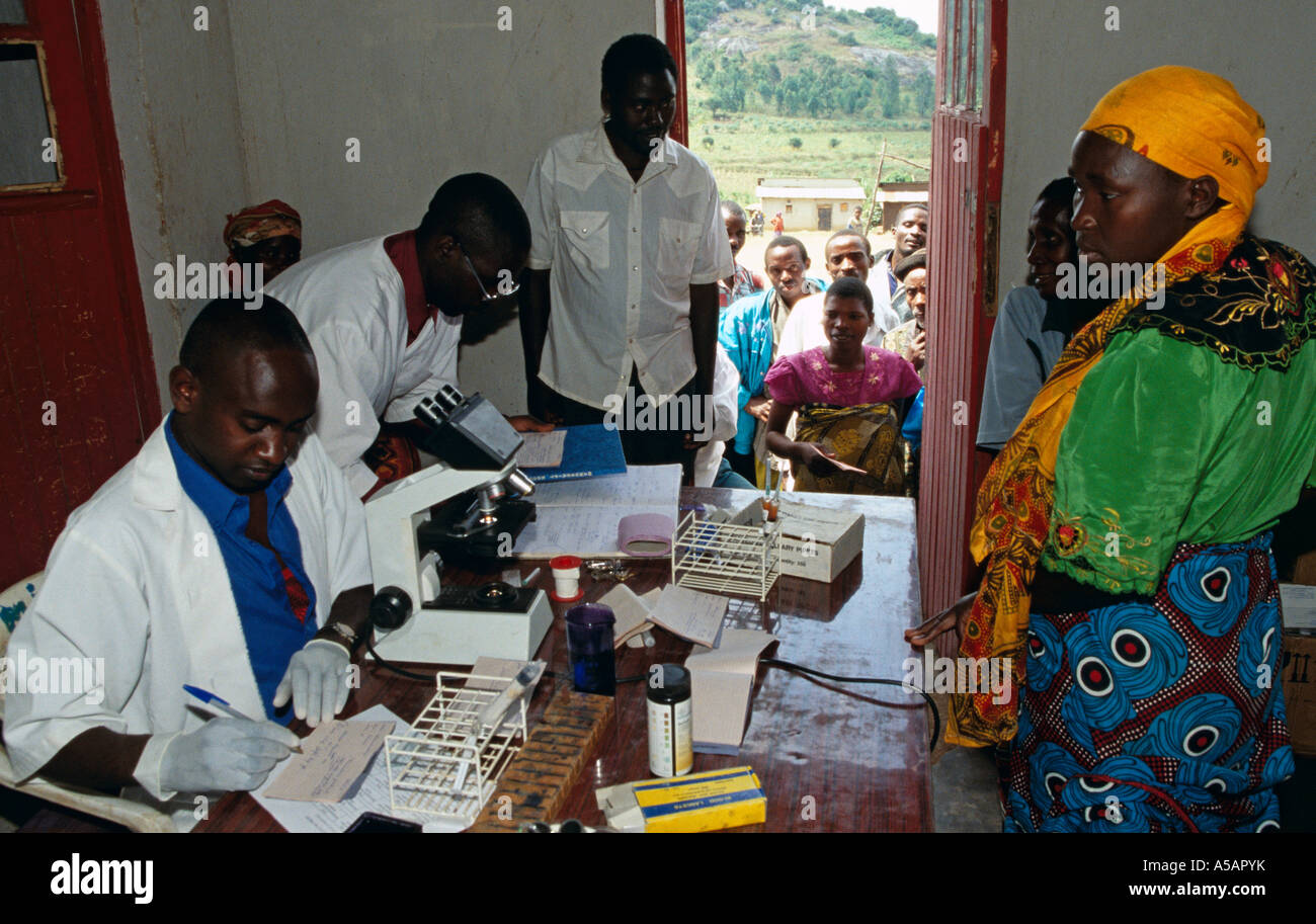 Doctor treating patients at health clinic, Kampala, Uganda Stock Photo