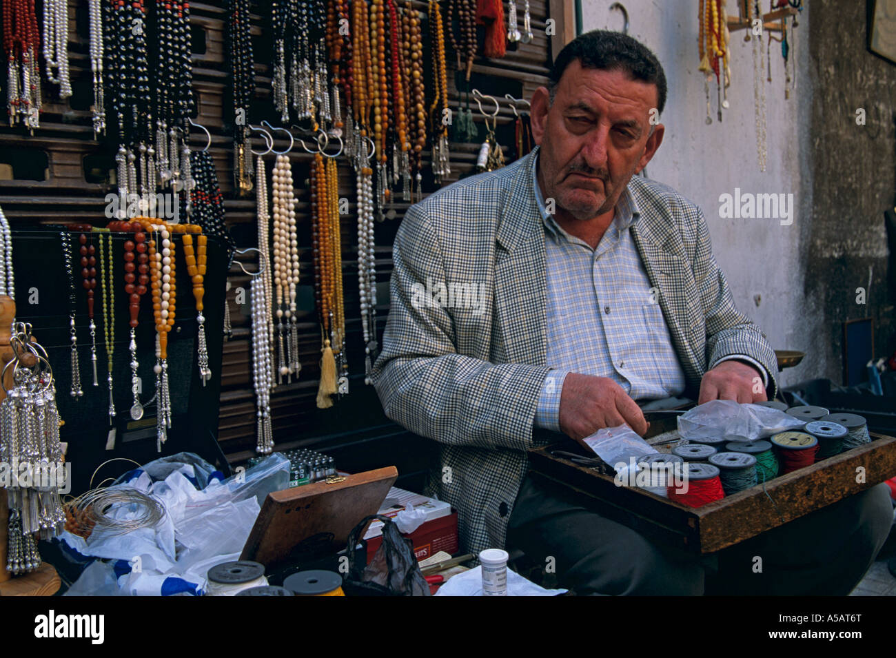 A vendor selling beaded jewelry Beirut Stock Photo Alamy
