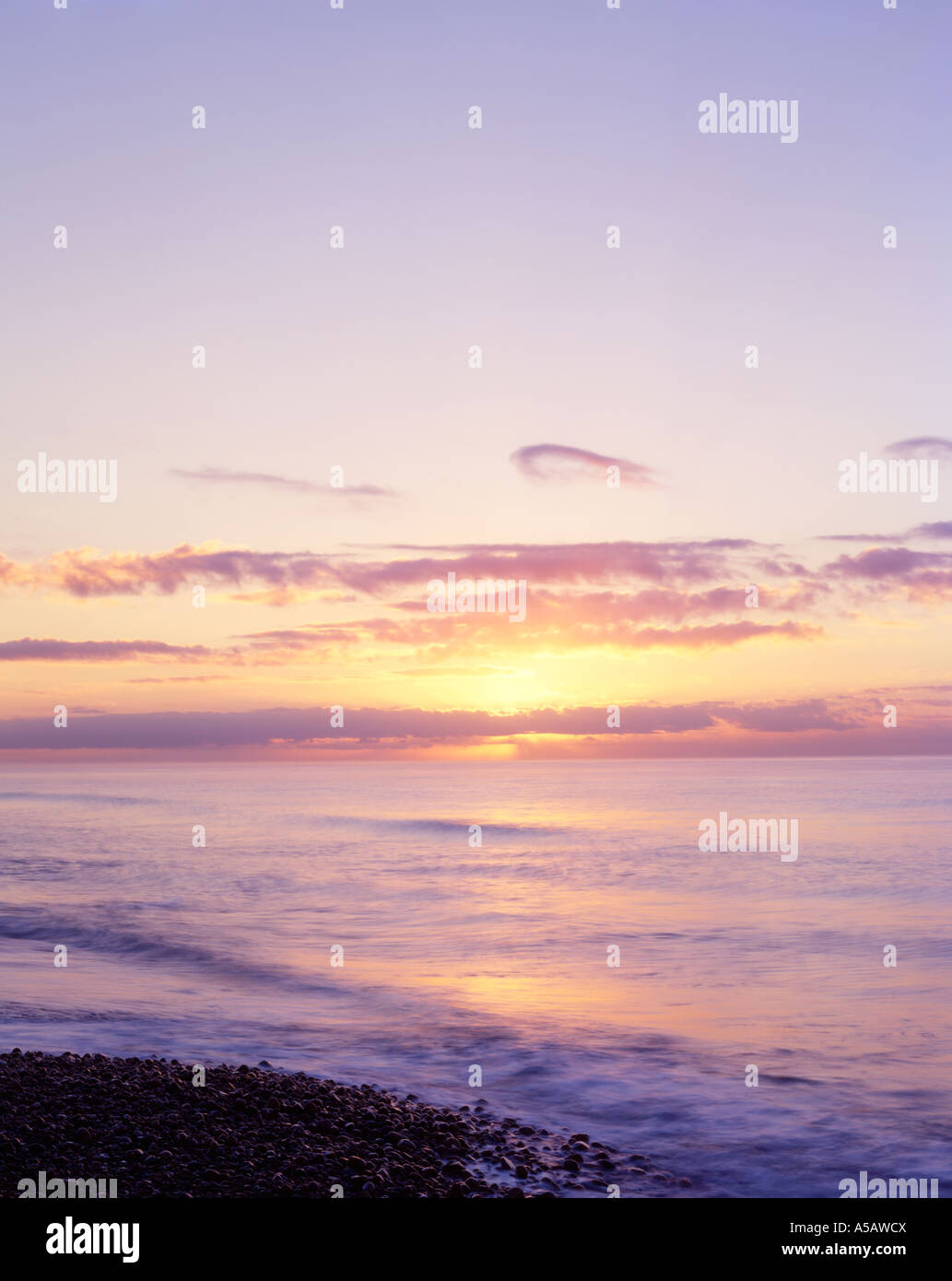 Beautiful Inspirational Ocean Sunrise over  Misquamicut Beach, Westerly, RI USA Stock Photo