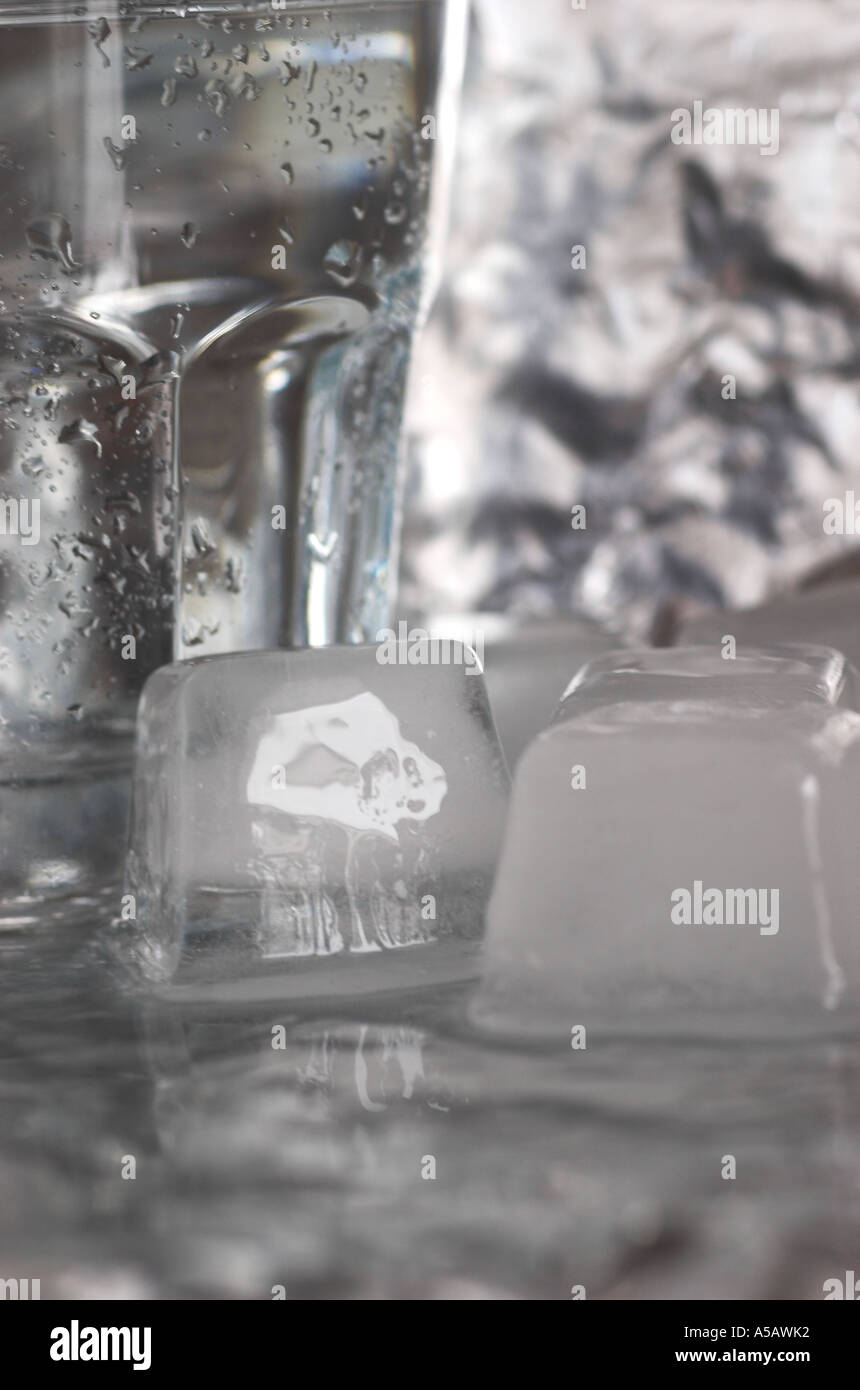 Glass of water with ice cubes Stock Photo - Alamy