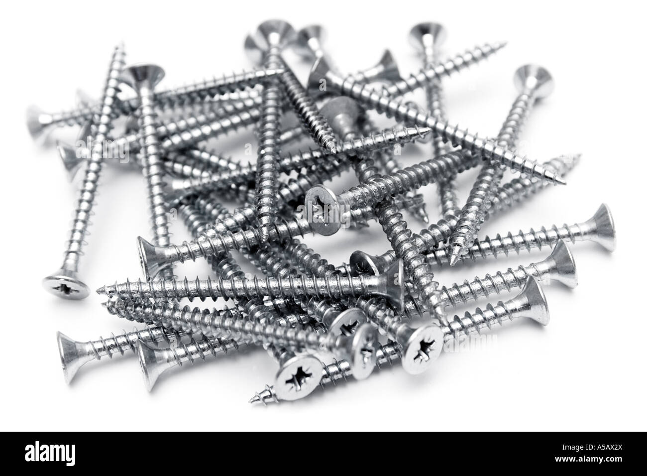 Bunch of screws isolated on a white background. Stock Photo