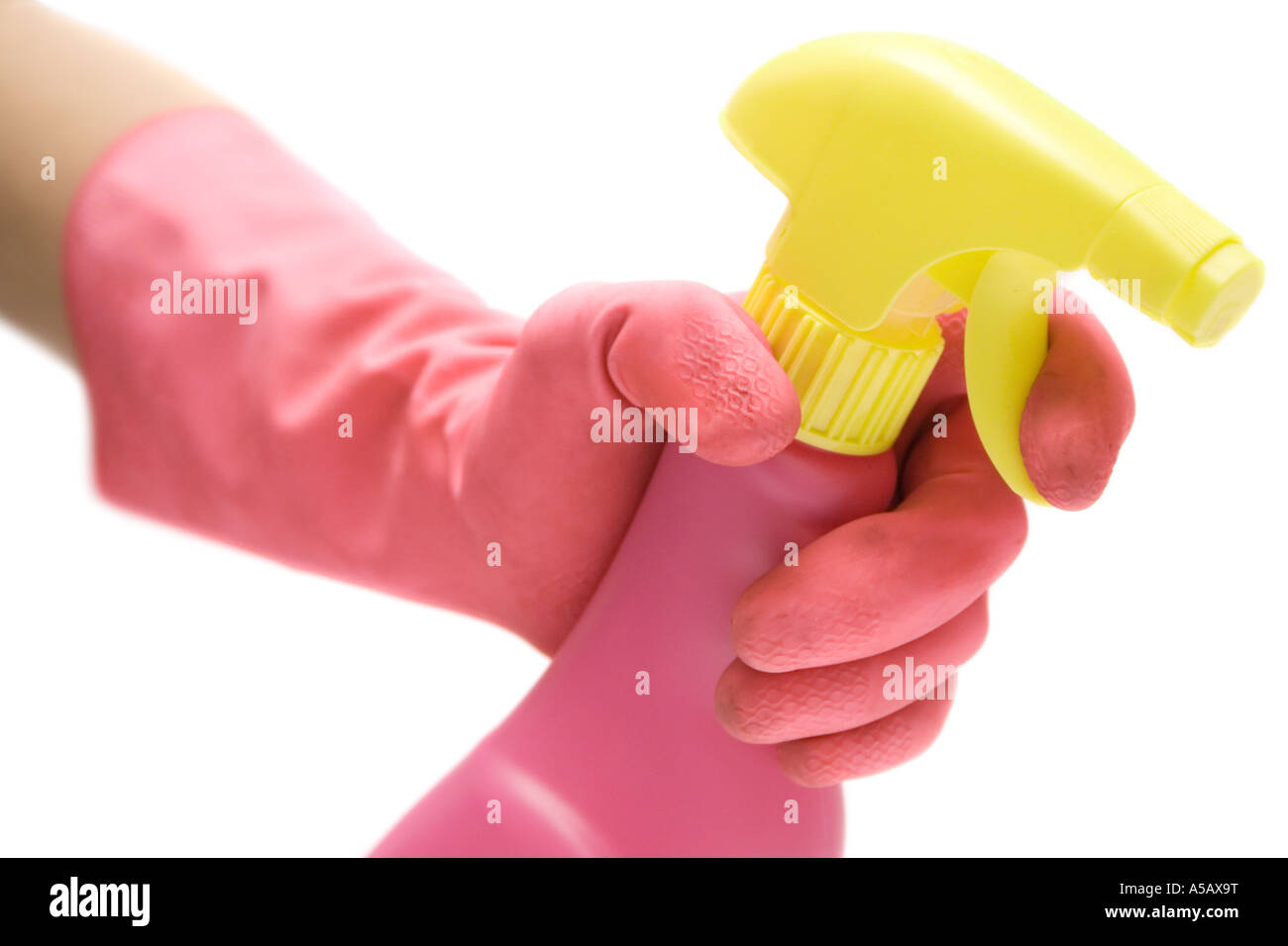Pink gloves and a cleaning agent isolated on a white background. Stock Photo
