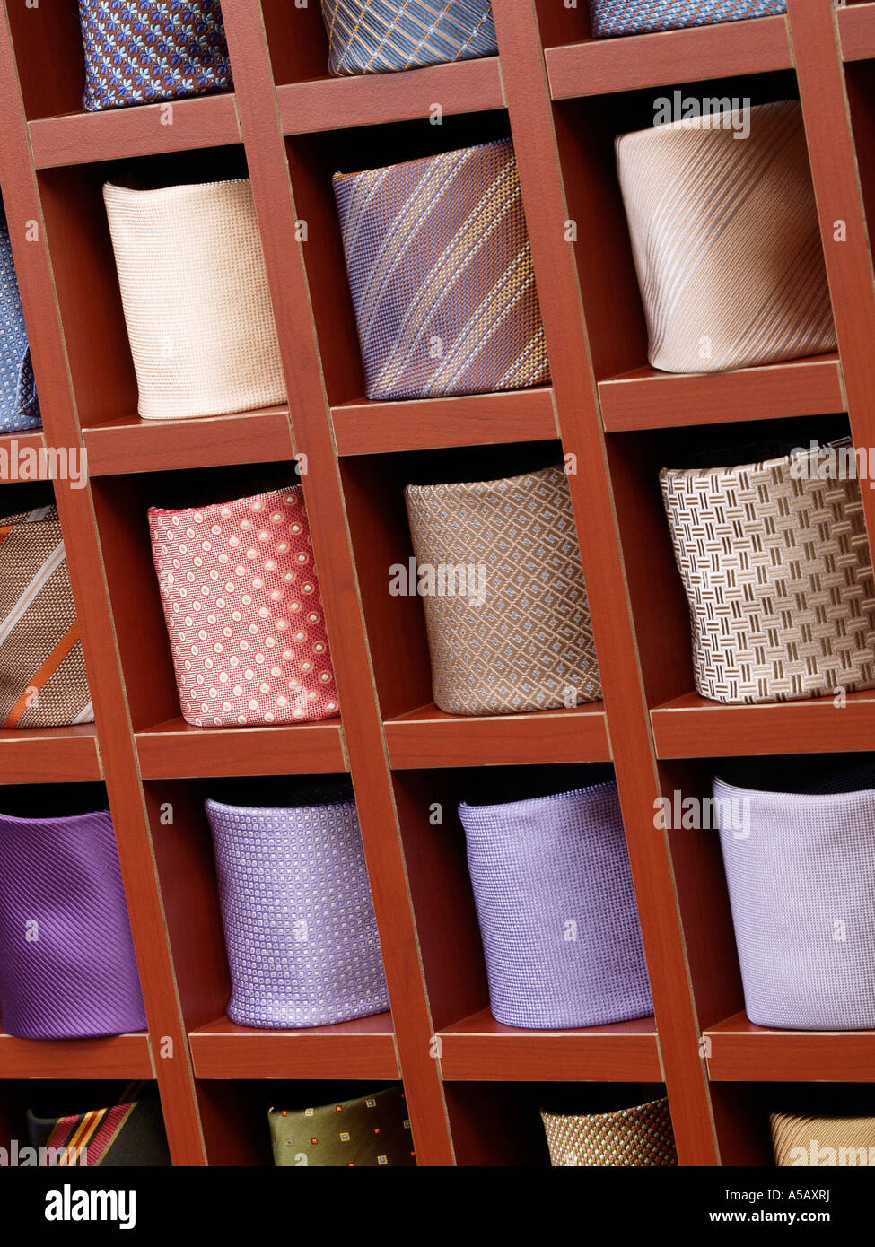 Display of ties mens fashion accessories shop rack shelves patterns colors trend suit clothes