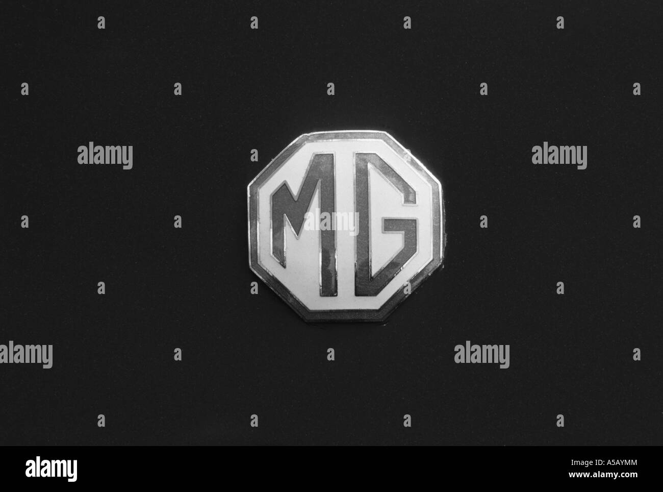 MG car badge. English car manufacturer Stock Photo Alamy