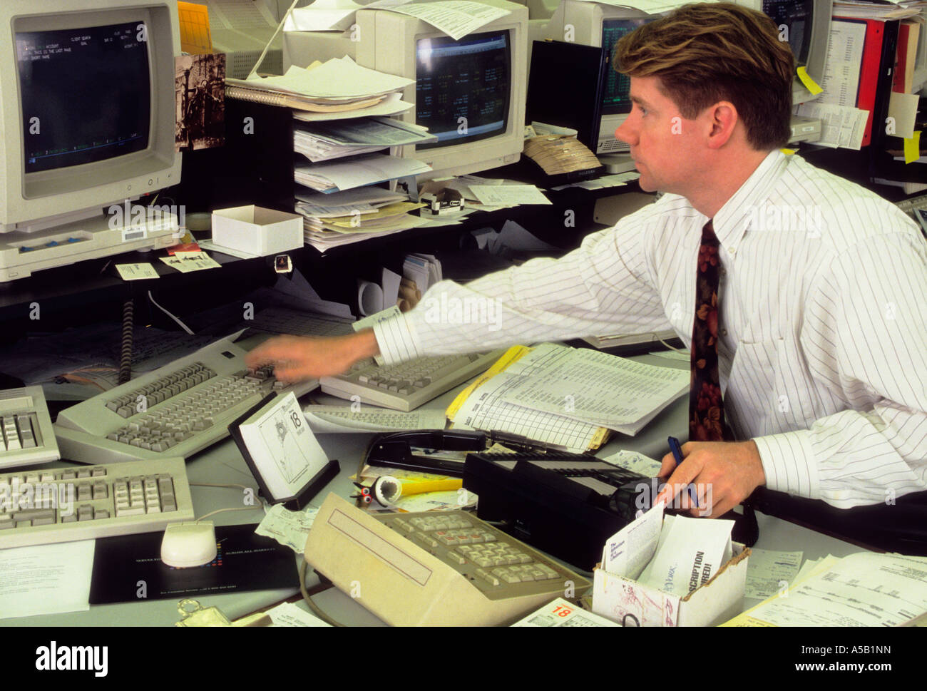 New York Wall Street Stock Brokerage Office New York Stock Exchange. Stockbroker at desk. Lower Manhattan, New York City, Financial District, USA Stock Photo