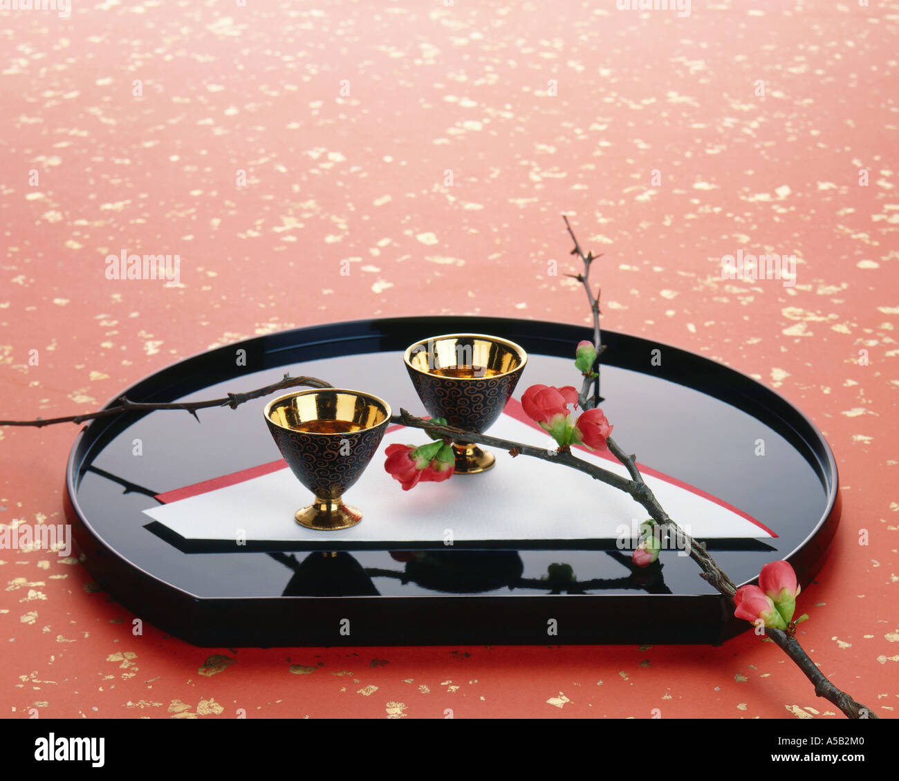 Sake cups on a tray Stock Photo Alamy