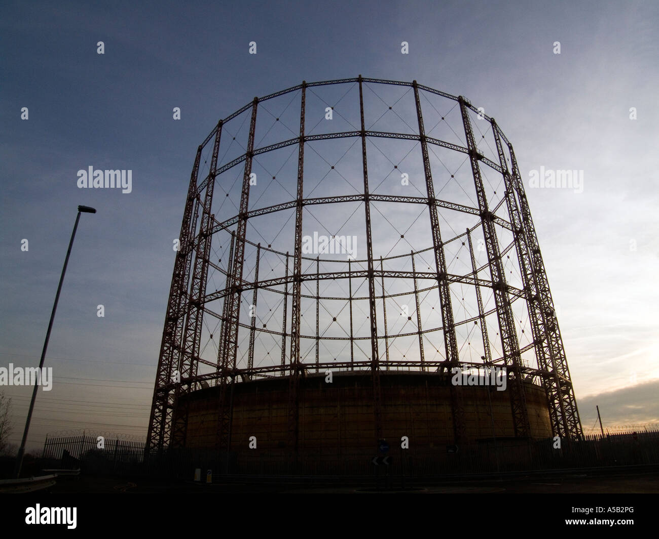 An empty gas tank against a sun set. Uk Stock Photo Alamy