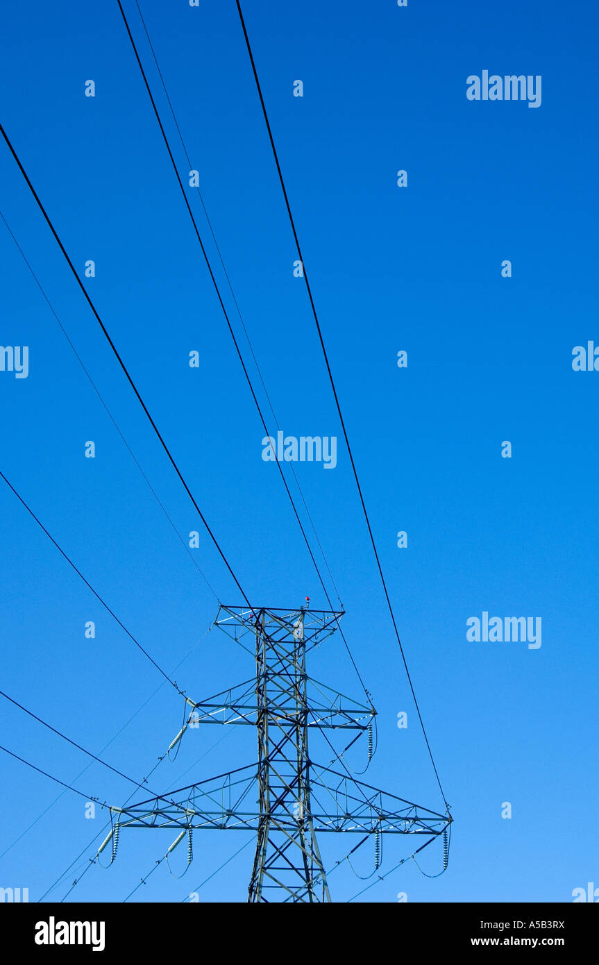 Hydro electric power lines against blue sky Stock Photo - Alamy