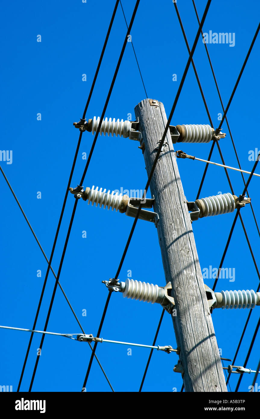 Power lines against a blue sky Stock Photo - Alamy