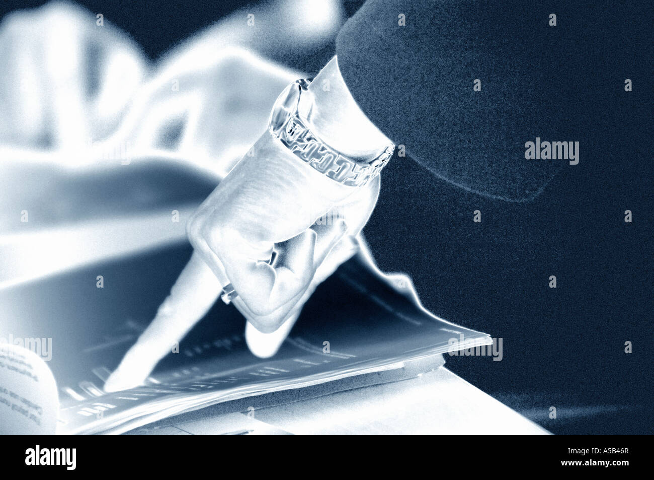 business-women-s-hand-pointing-at-documents-stock-photo-alamy