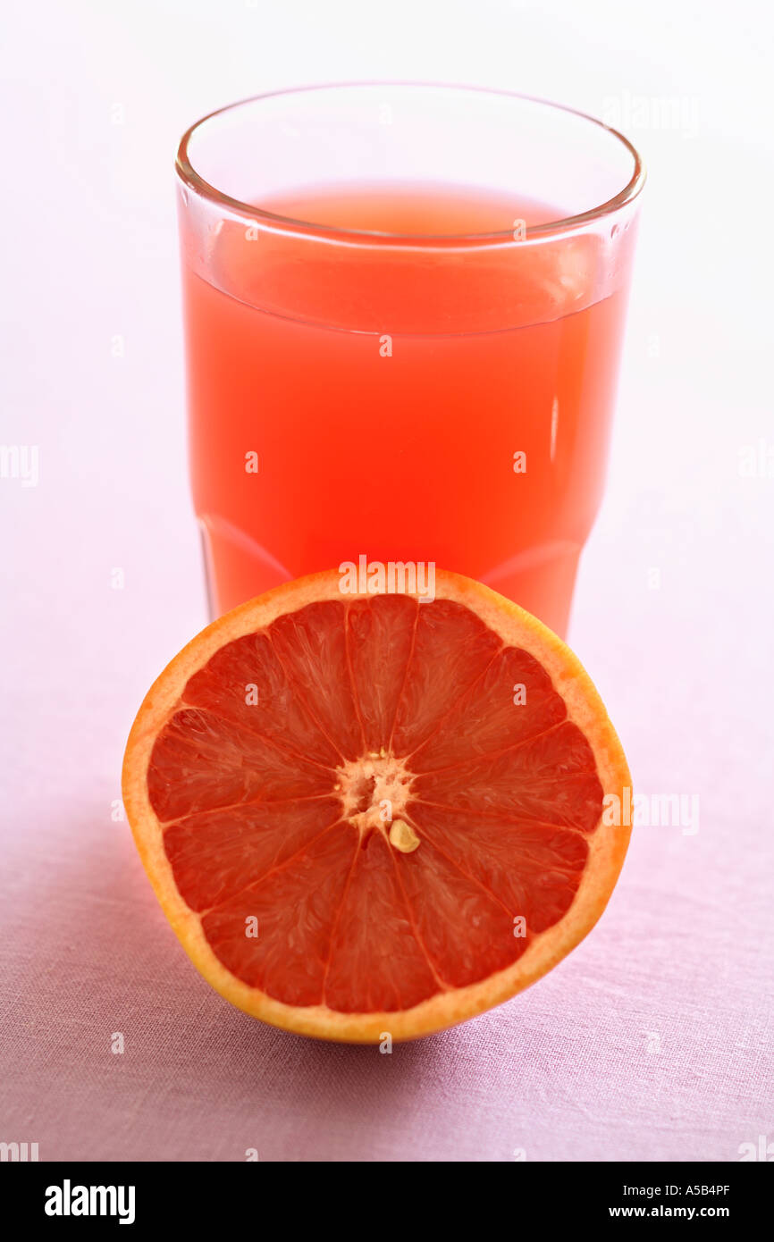 Glass of Grapefruit Juice and Half Fresh Grapefruit Stock Photo Alamy