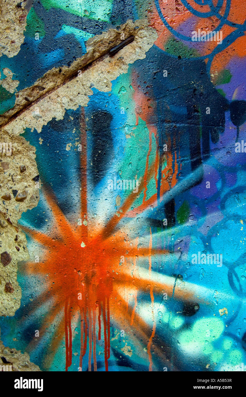 Graffiti explosion on cement wall Stock Photo - Alamy