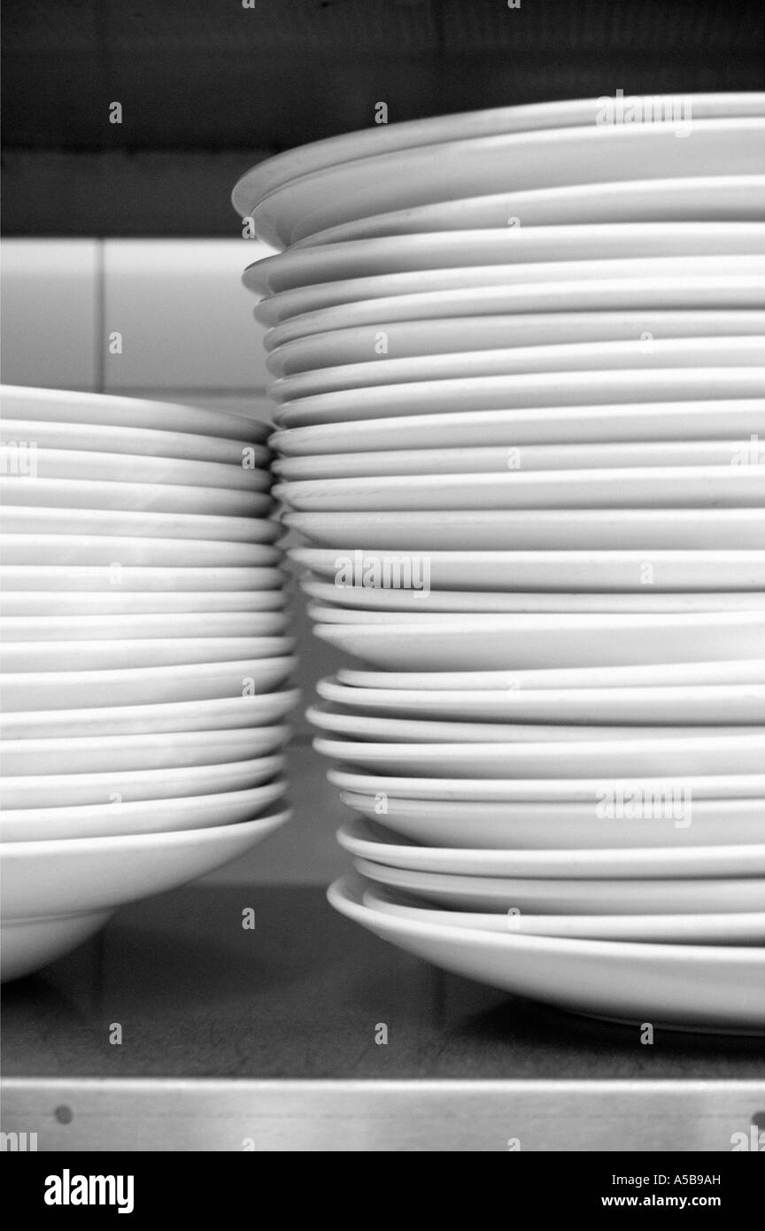 Stack of ready dishes in restaurant kitchen Stock Photo Alamy