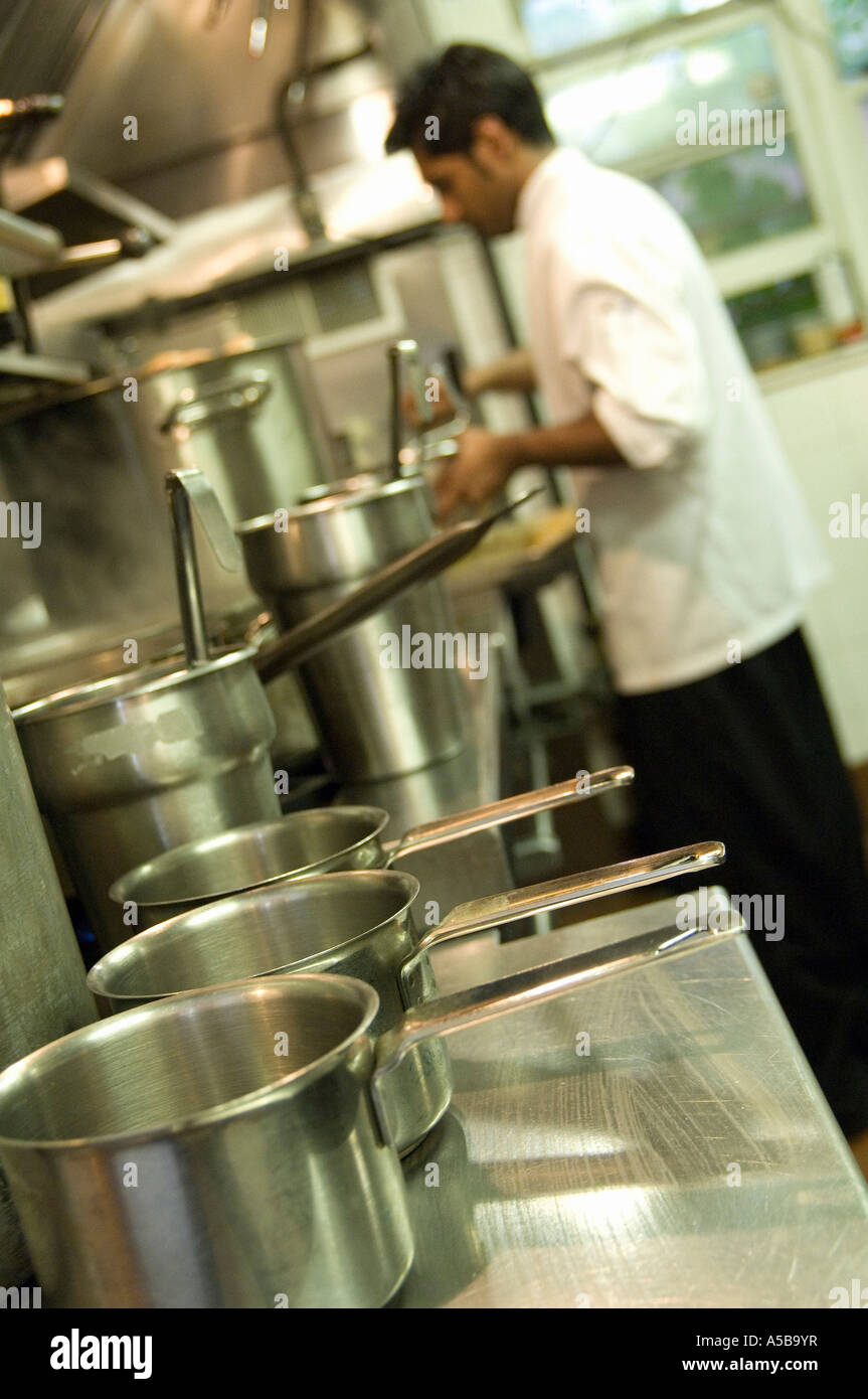 Restaurant kitchen staff busy at work Stock Photo Alamy