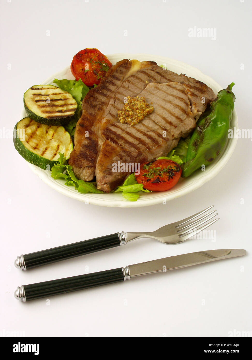 Beefsteak and vegetables Stock Photo