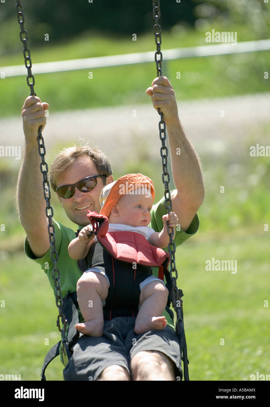 Vertical baby swings playground hires stock photography and images Alamy