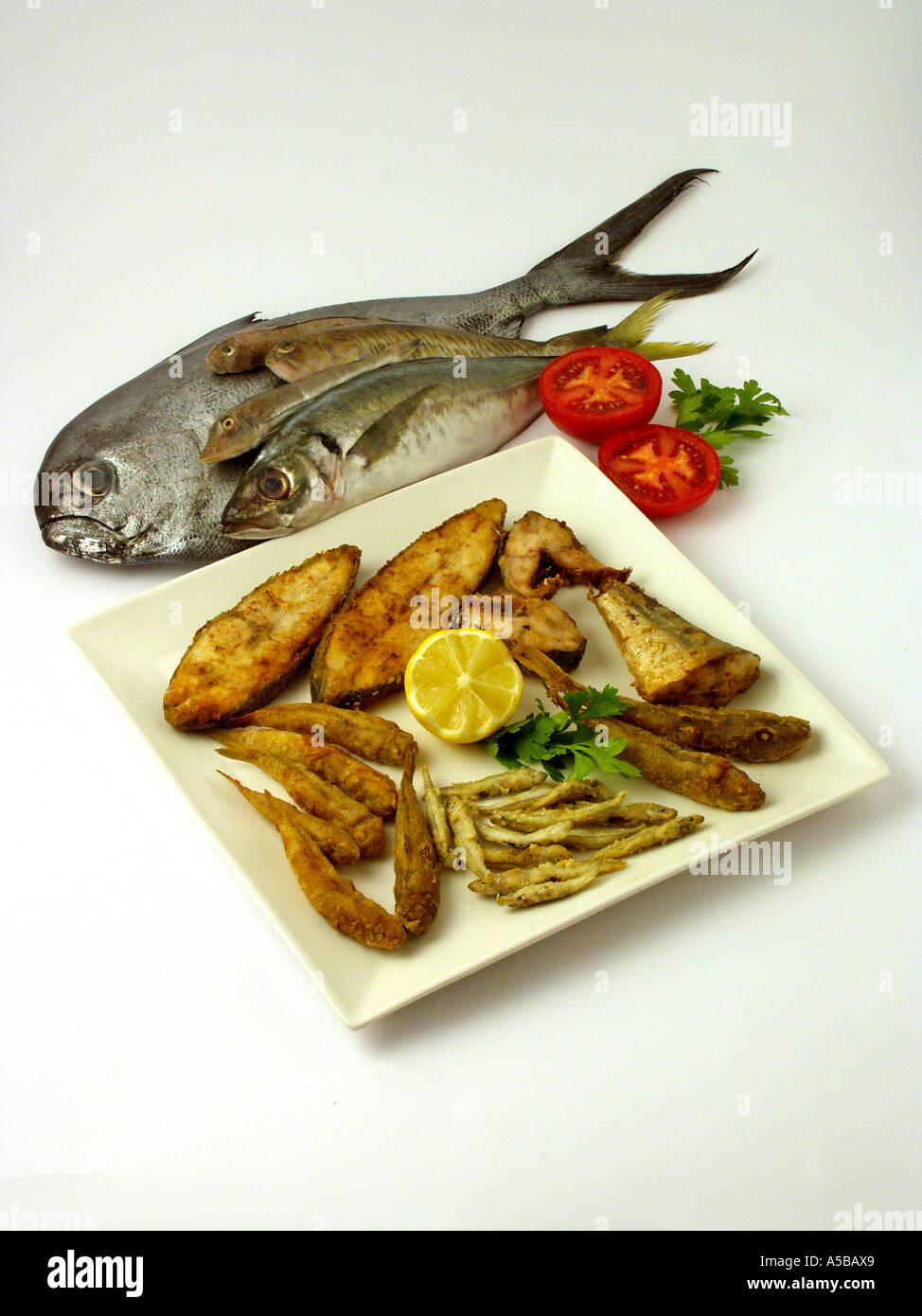 Fish on a table Cut Out Stock Images & Pictures - Alamy