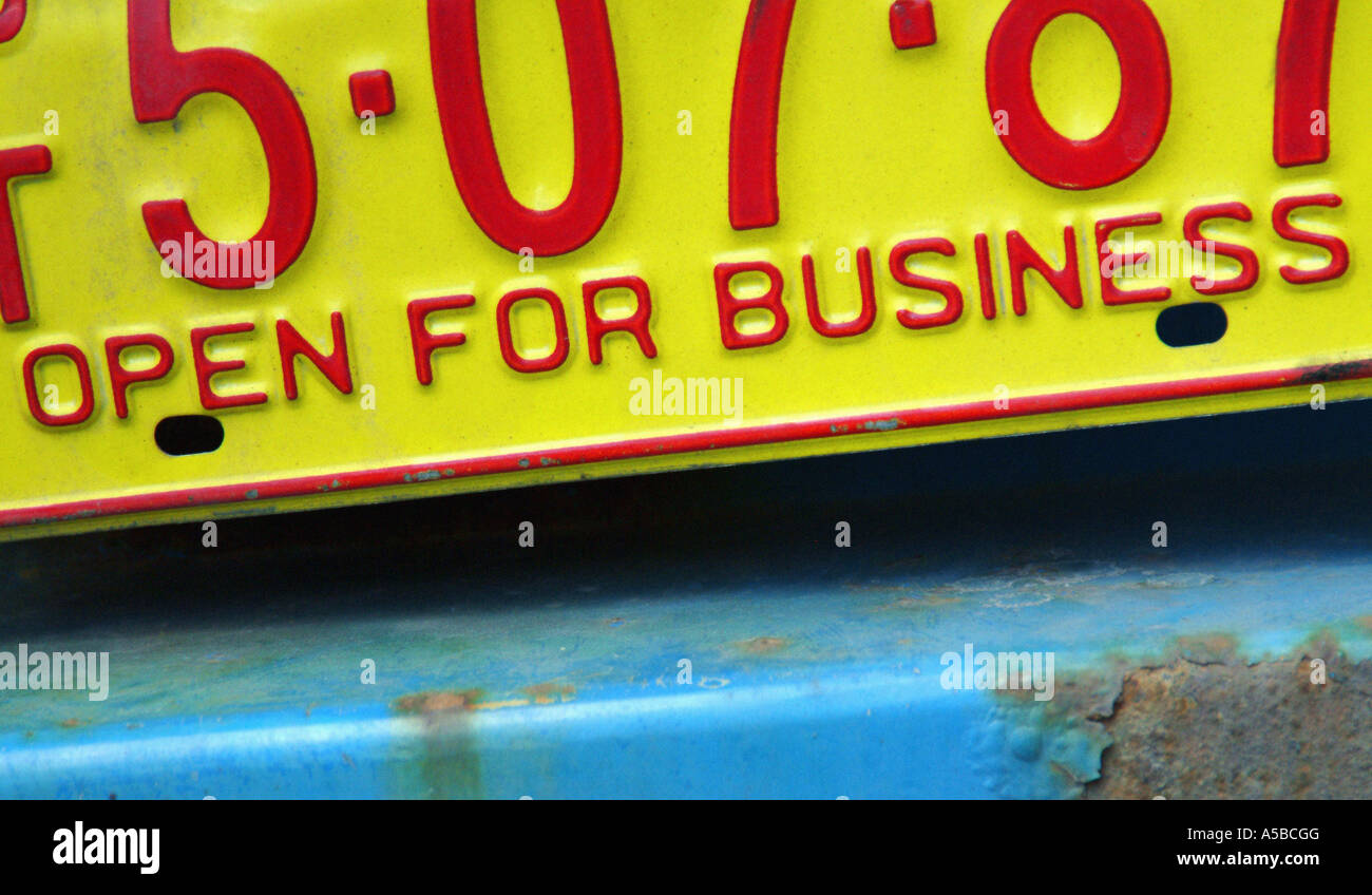 Open for business, license plate. Stock Photo