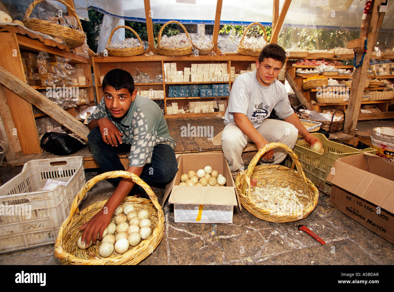 Workers in traditional soap shop, Tripoli, Lebanon Stock Photo