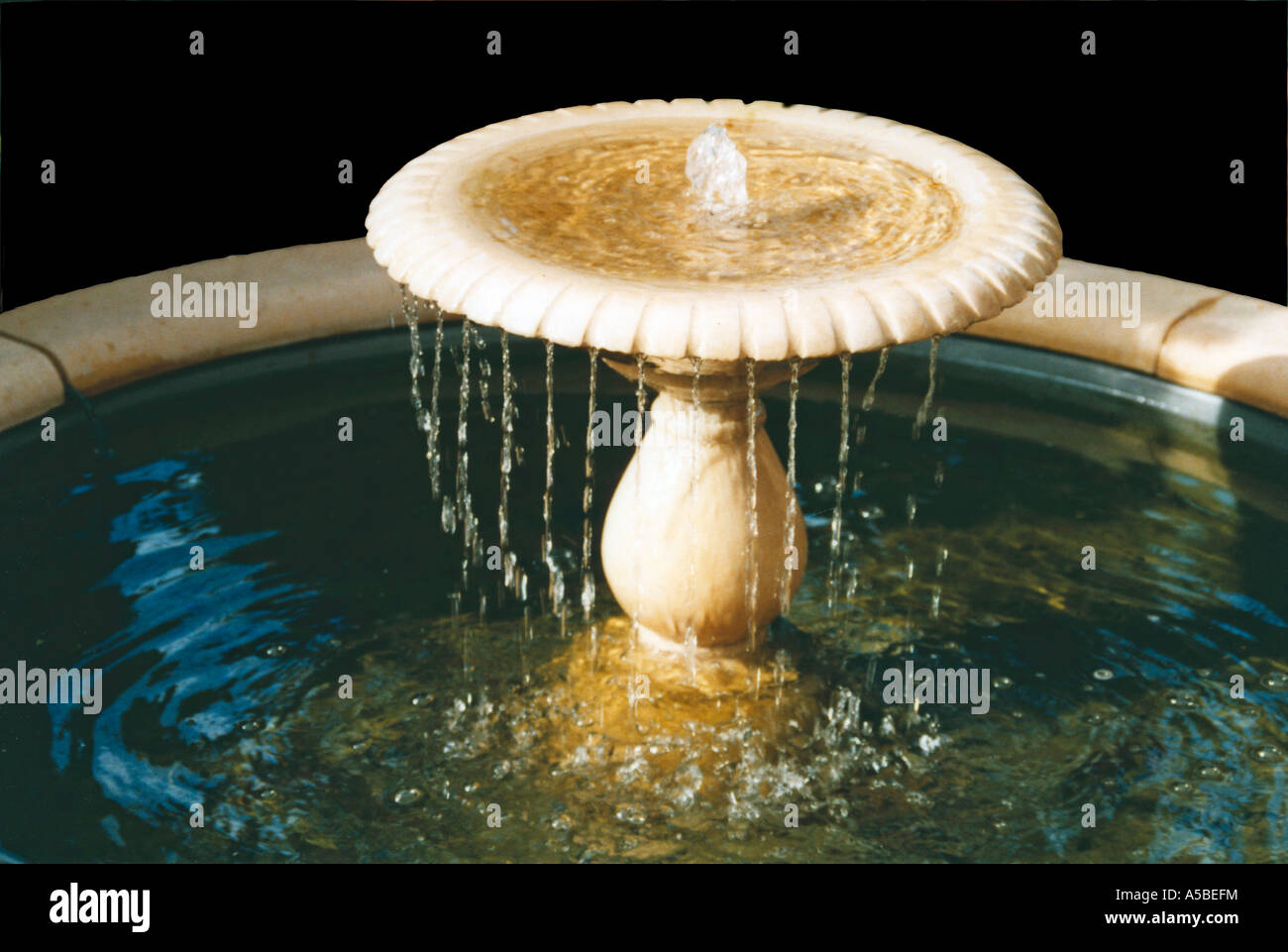 water fountain feature in garden Stock Photo