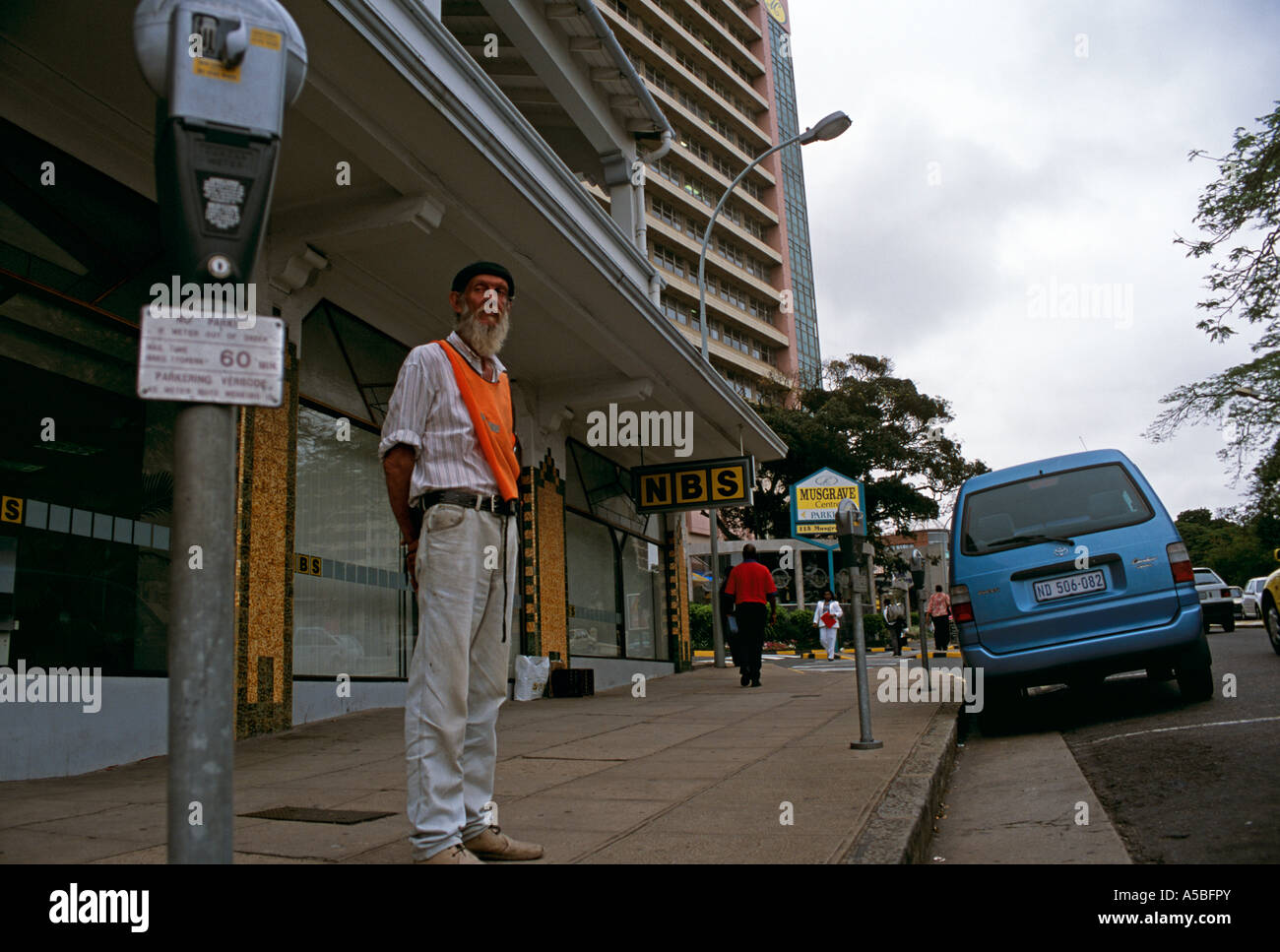 A guard standing on the street South Africa Stock Photo