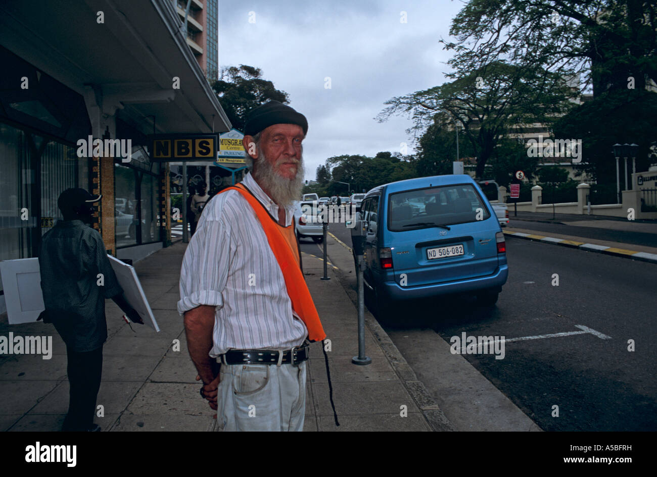 A guard standing on the street South Africa Stock Photo