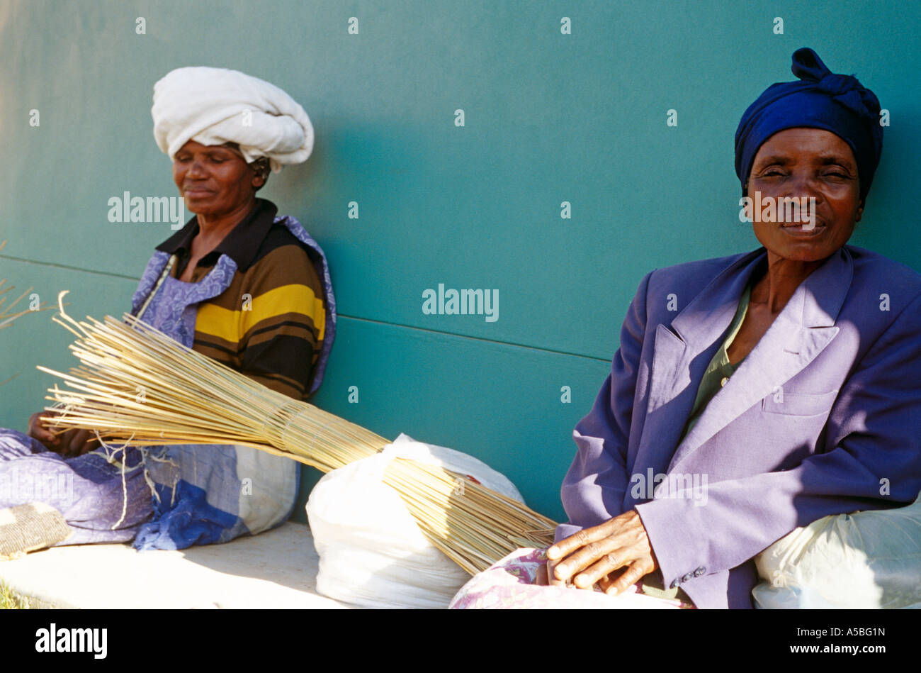 Two women sitting together in South Africa Stock Photo