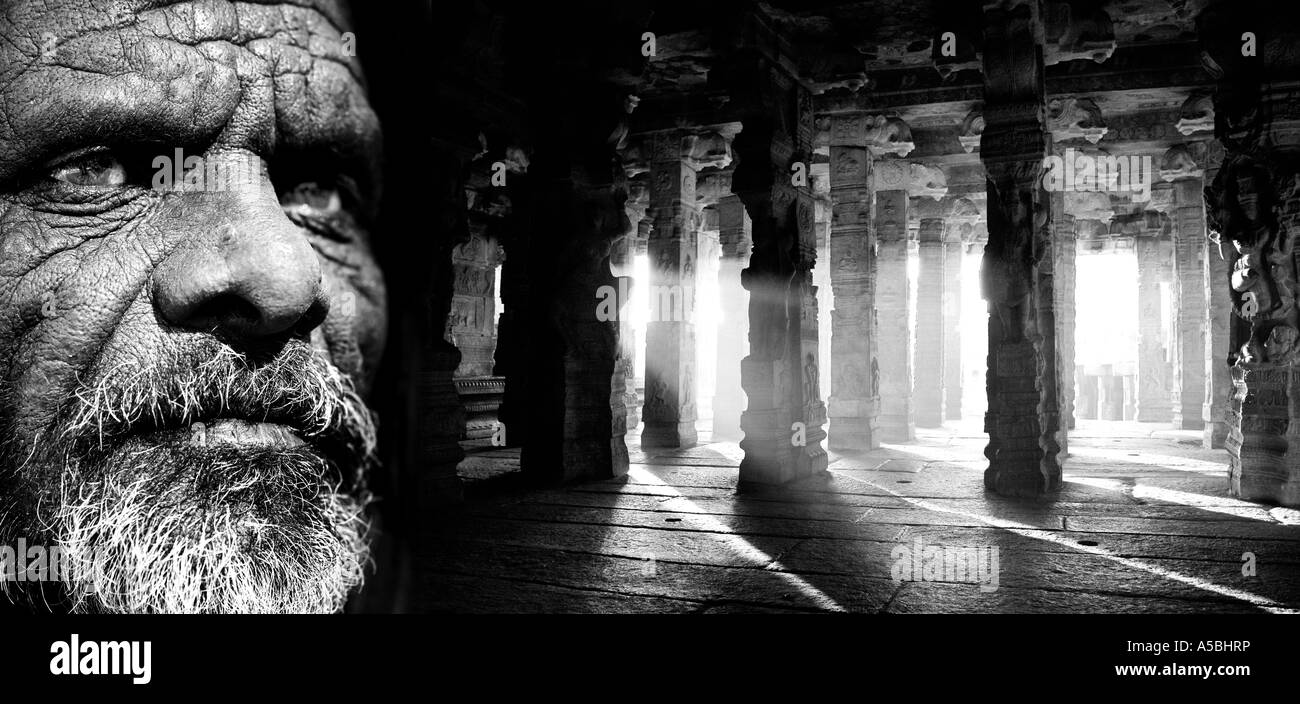 Composite of an old Indian man and a monochrome shot of the temple pillars.  Lepakshi, Andhra Pradesh, India Stock Photo
