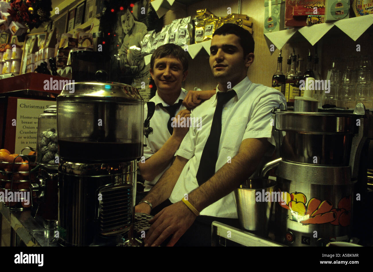 Two men wait for customers at the Bar Italia in Soho London Stock Photo
