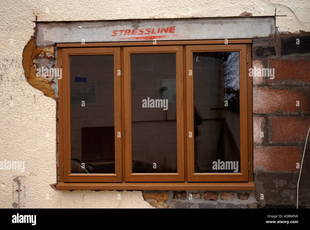 INSTALLING A NEW HANDMADE HARDWOOD CASEMENT WINDOW IN A COTTAGE UNDER
