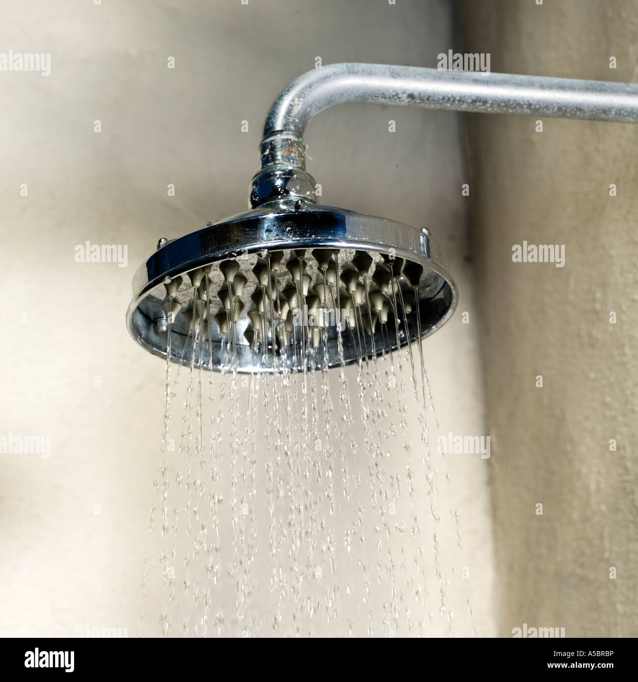 Water jet from wide shower head conservation shortages and rationing