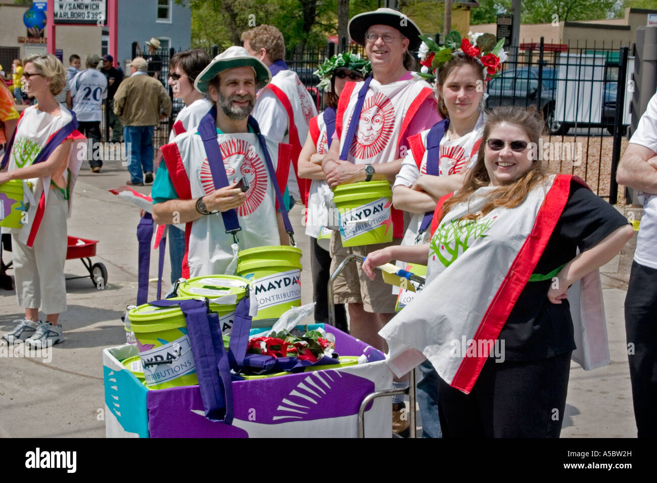 Mayday fund solicitors with buckets. In the Heart of the Beast May Day Festival and Parade Minneapolis Minnesota USA Stock Photo