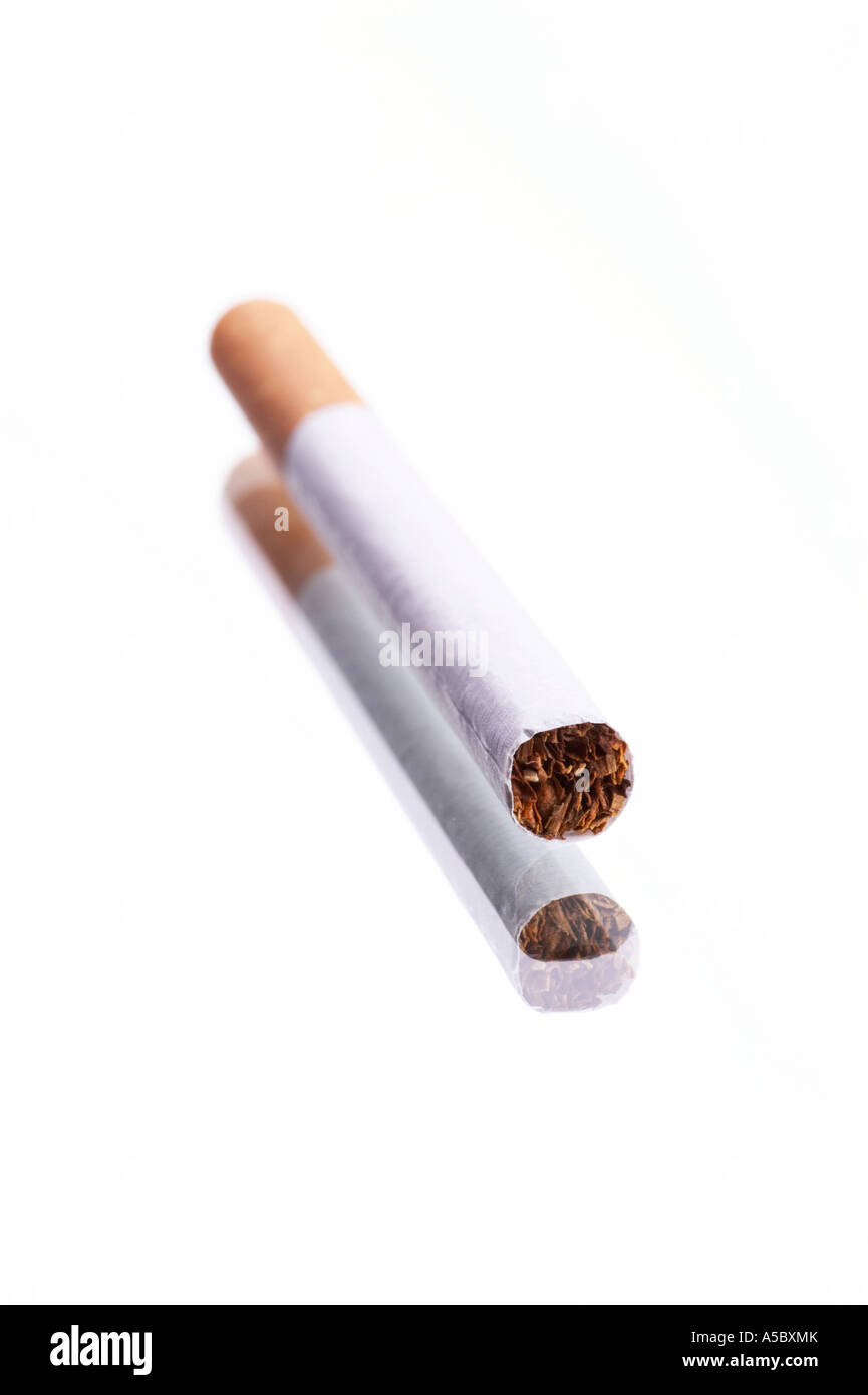 One cigarette on a mirror, white background Stock Photo Alamy