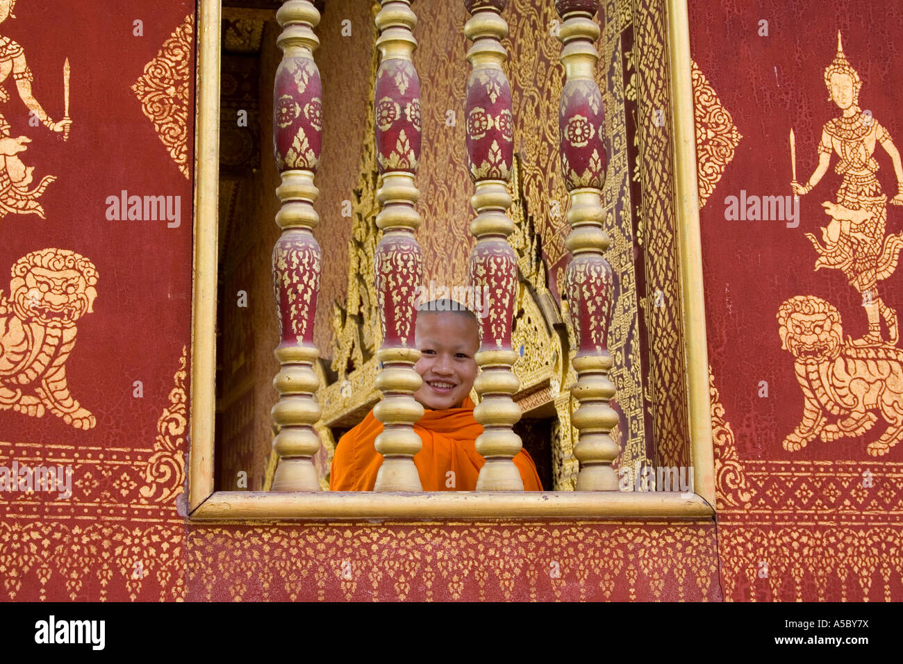 Novice Monk Through Temple Window Wat Saen Vat Sene Luang Prabang Laos Stock Photo