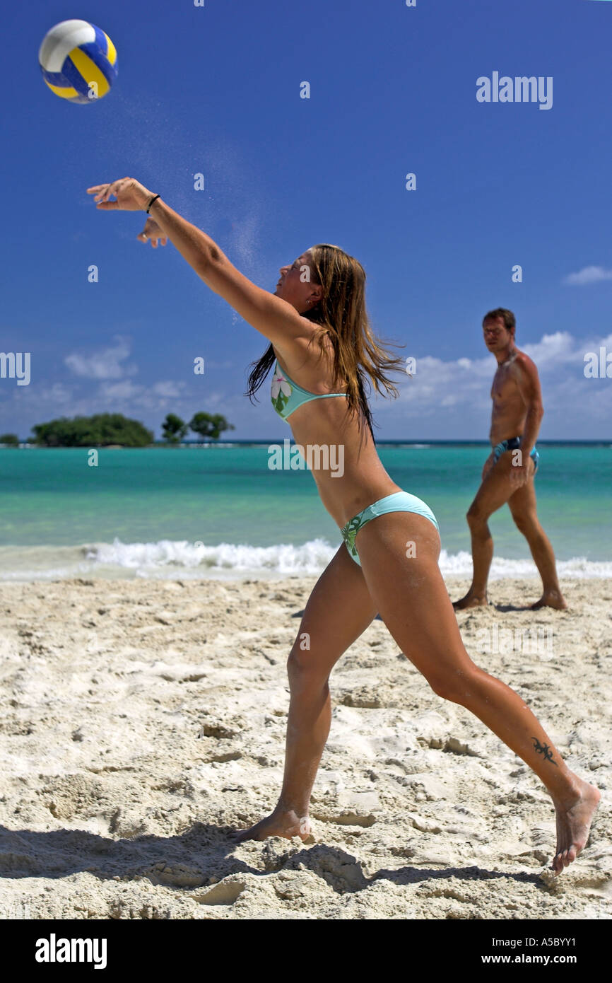 Young woman in green bikini serving playing beach volleyball Chaweng Beach  Ko Samui island Thailand Stock Photo - Alamy
