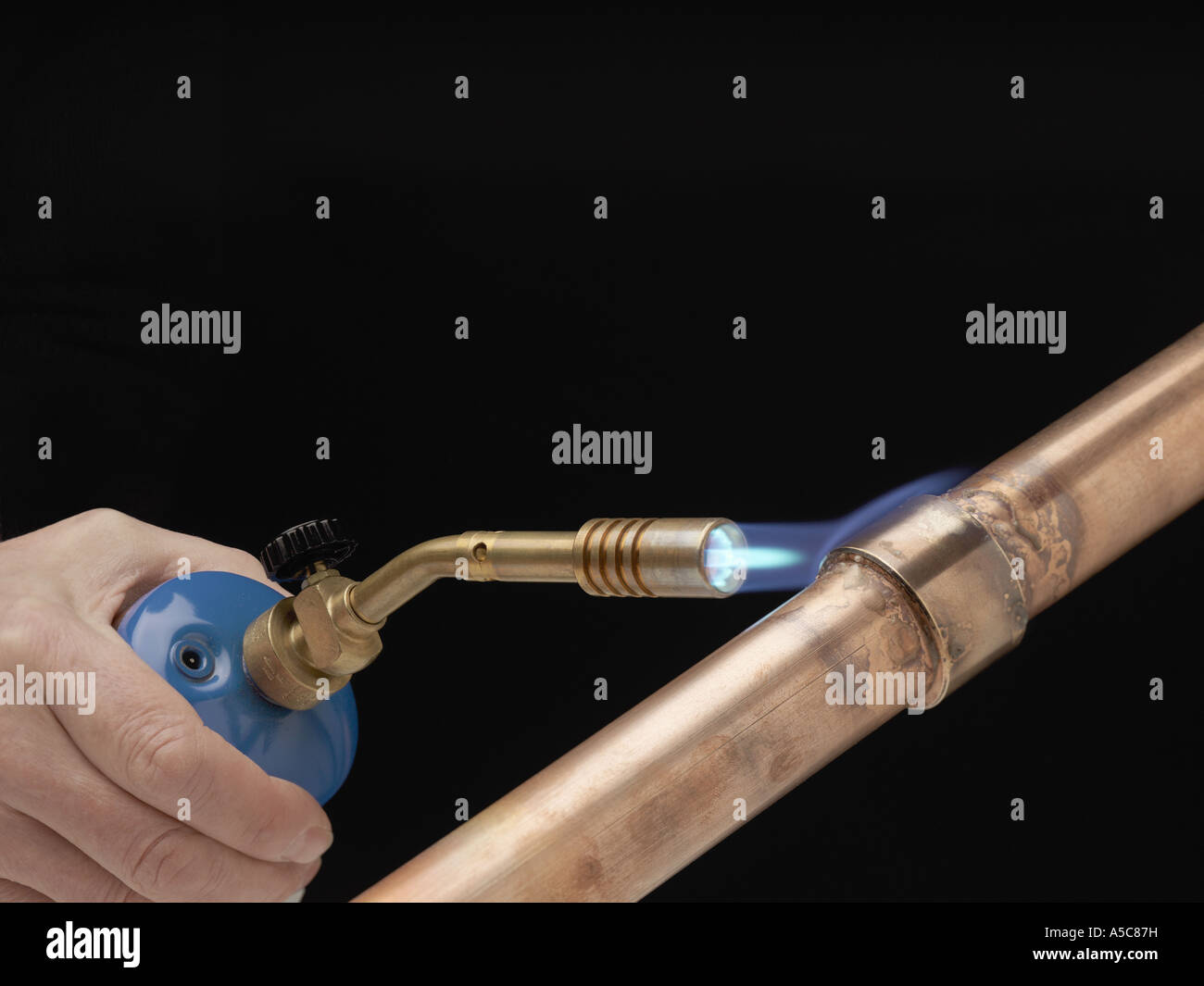 Copper pipe blow torch hi-res stock photography and images - Alamy