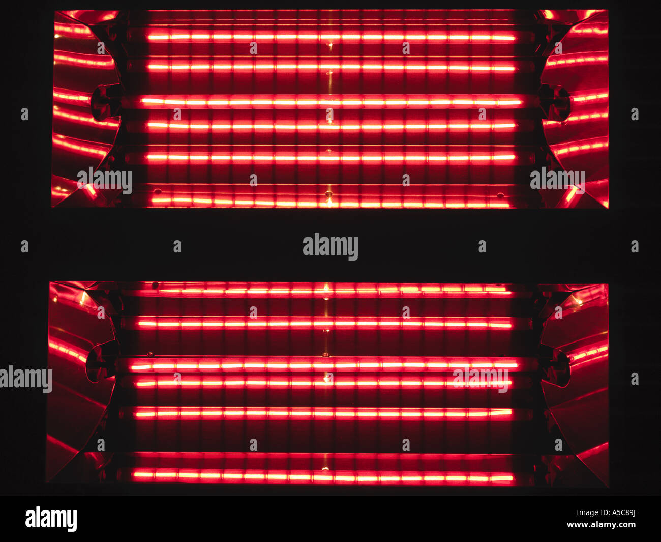Elements of a heater glowing red to give an impression of warmth Stock