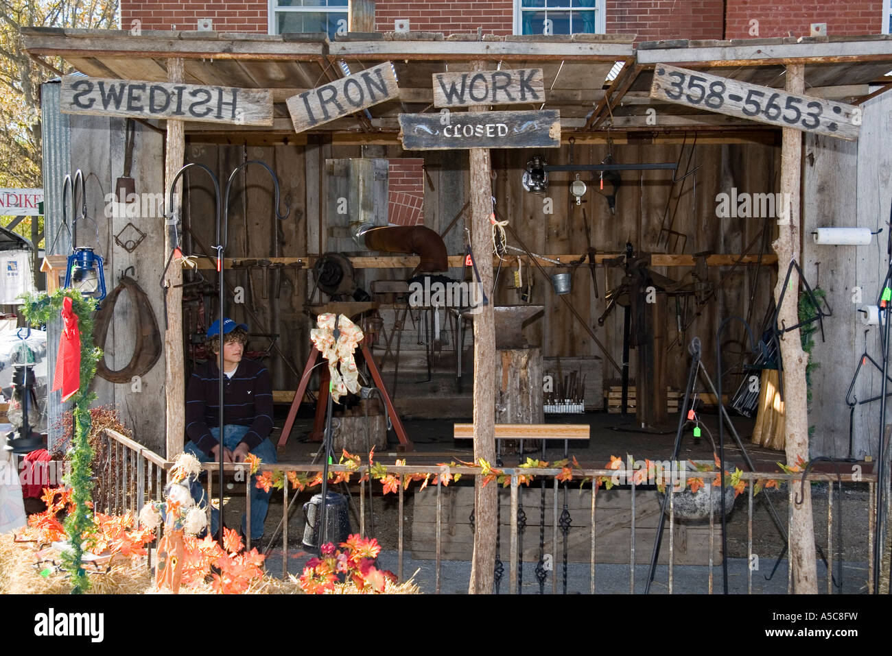 Missouri MO USA A Swedish blacksmith stand in Kimmswick MO October 2006