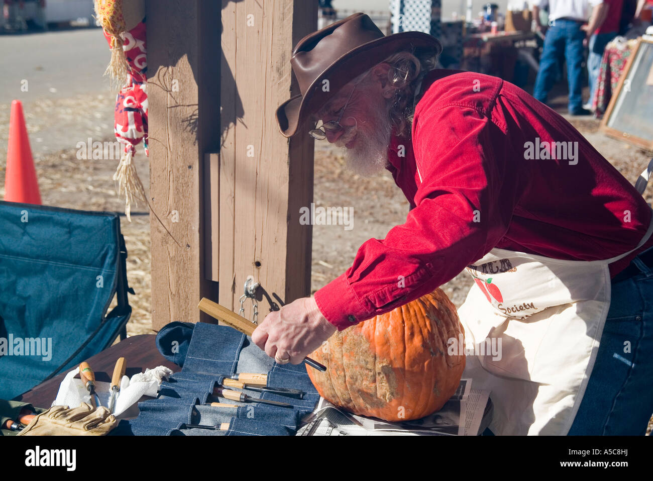 Missouri MO USA Carving pumpkins for Halloween at the apple butter