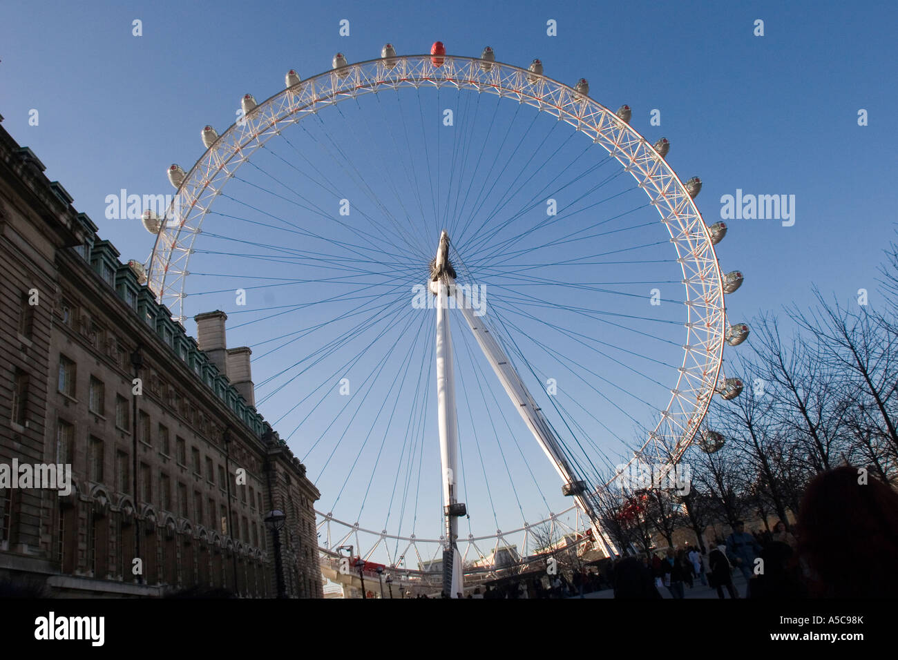 The London Eye against blue sky Stock Photo - Alamy