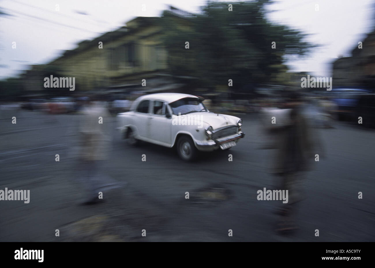 White ambassador taxi in Kolkata, India.  (Blurred motion) Stock Photo