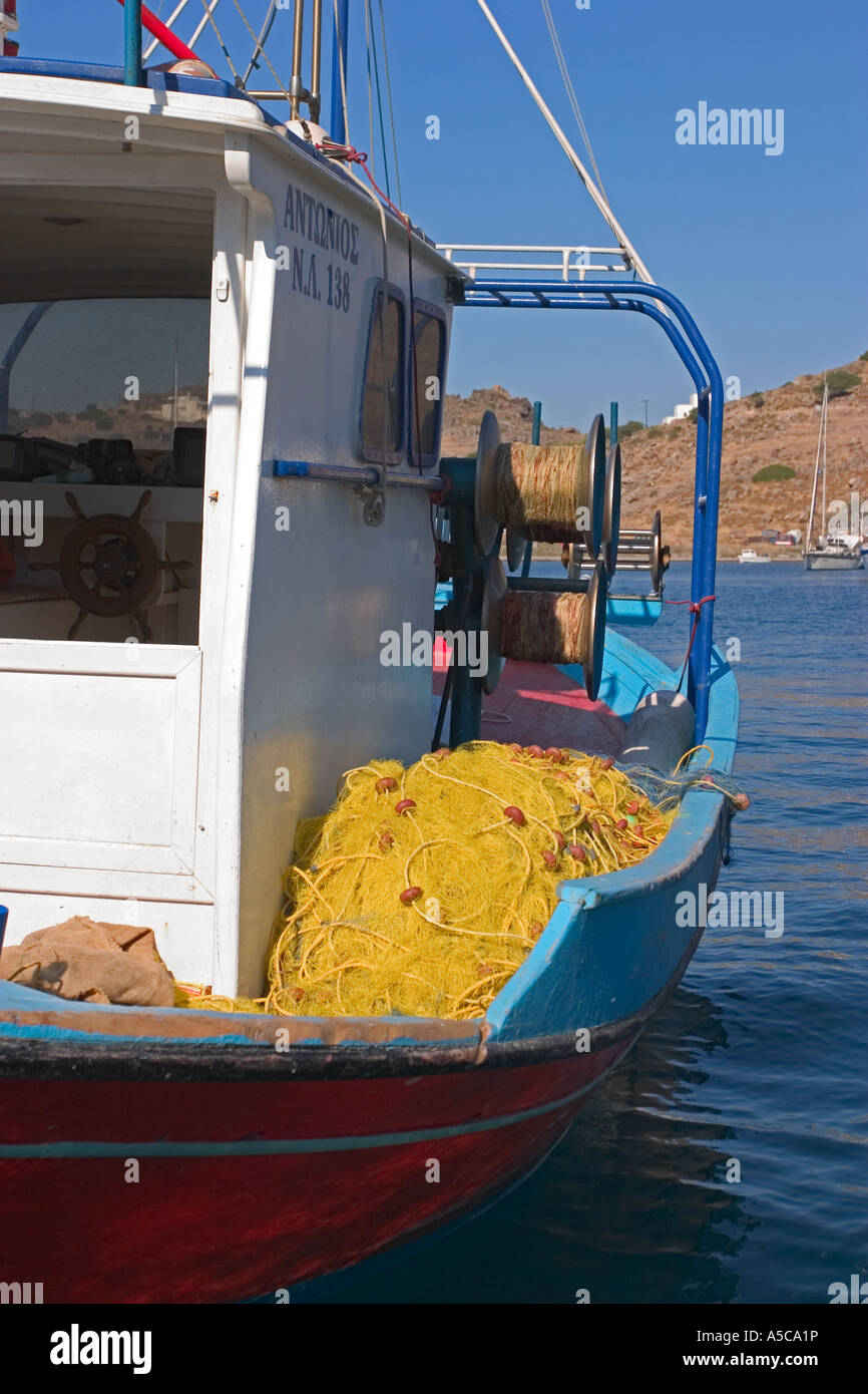 fishing rowing  preparing fishnet cos kos islands dodecanese greece Stock Photo