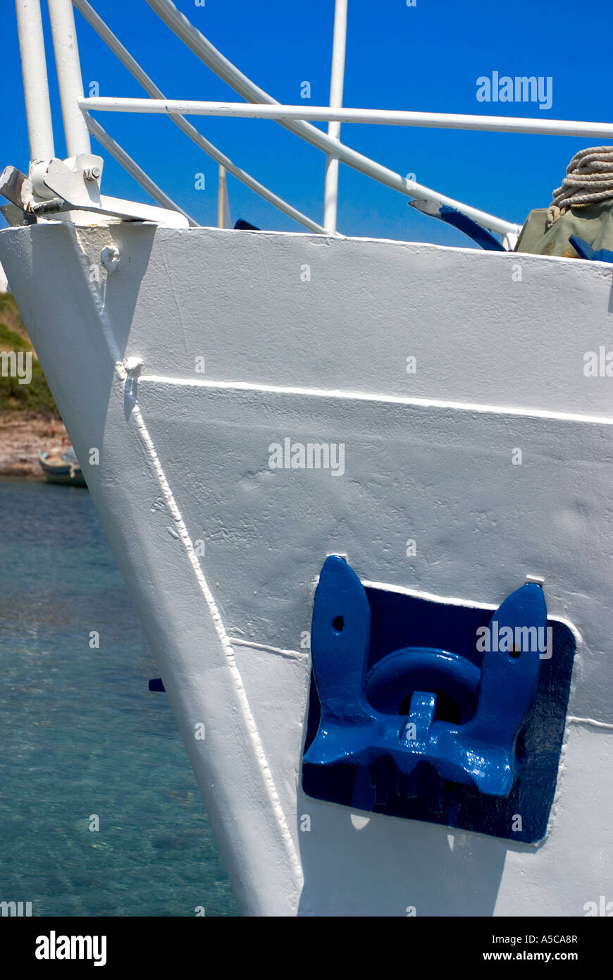 Anchors drawn into the hawse pipes on the ship in greece Stock Photo