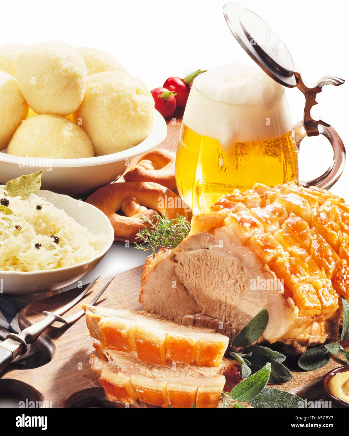 German roast pork with dumplings Stock Photo Alamy