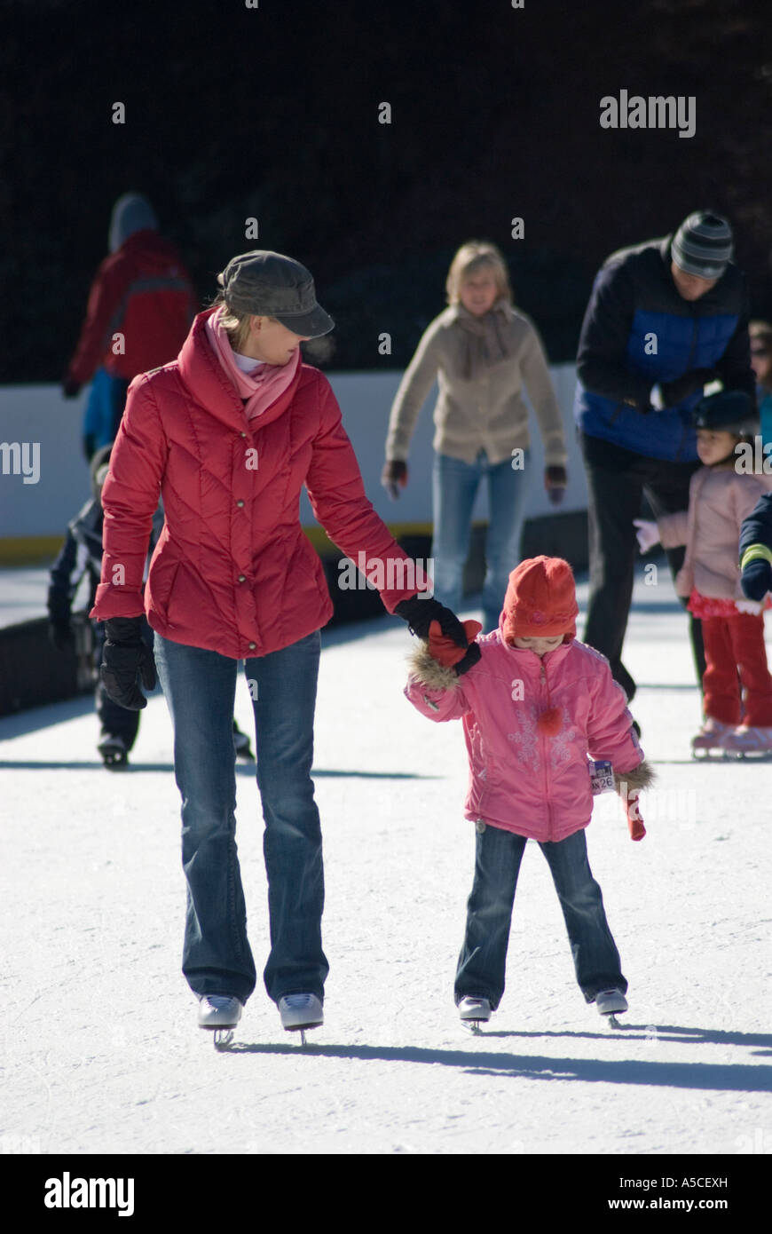 Mother and Daughter Ice Skating at Wollman Rink in Central Park Stock Photo