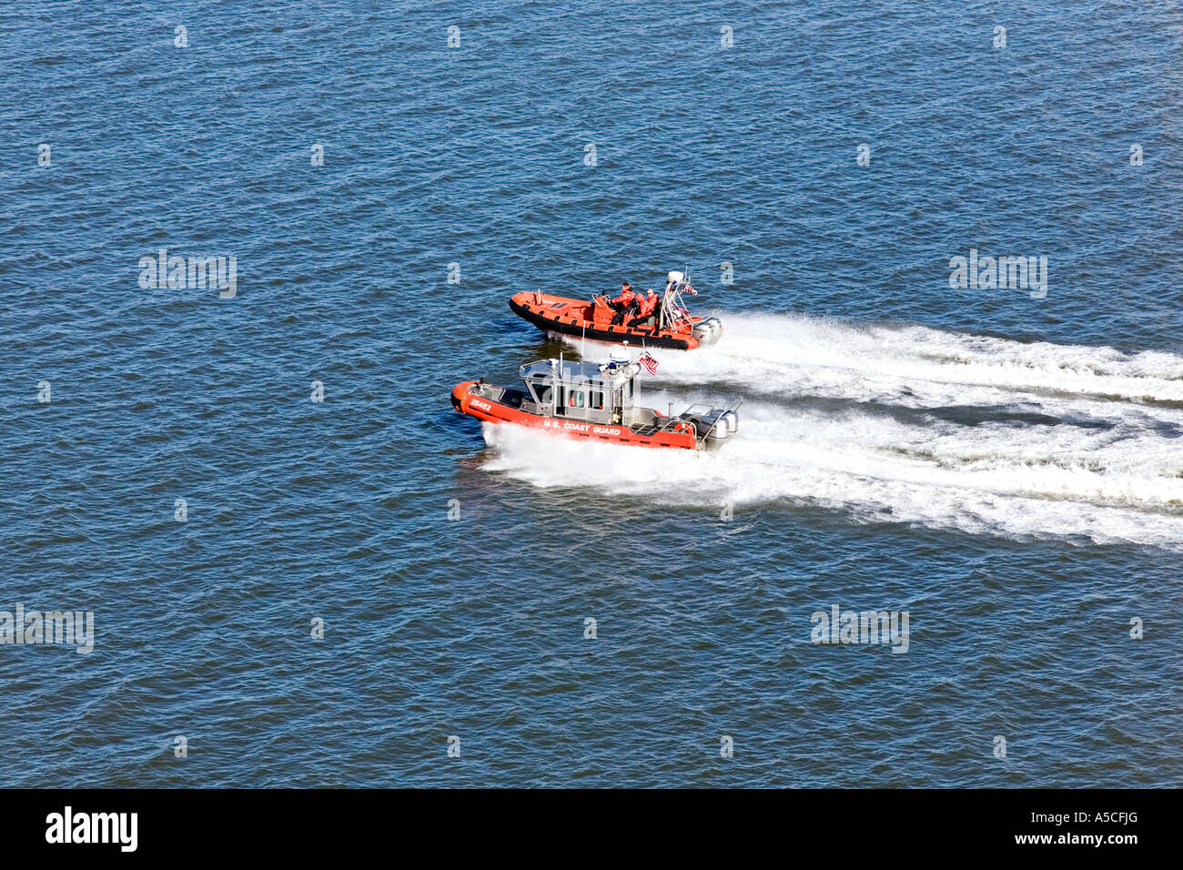 Coastguard boats race in channel at Galveston bay Stock Photo - Alamy