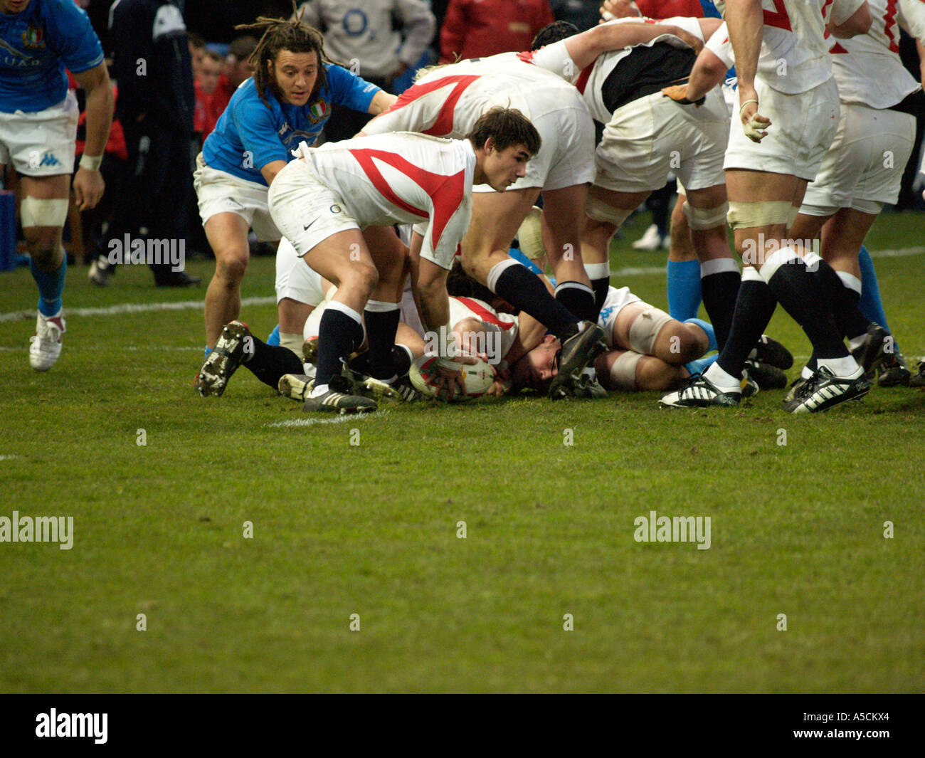 Harry Ellis clears the ball as the scrum collapses Stock Photo