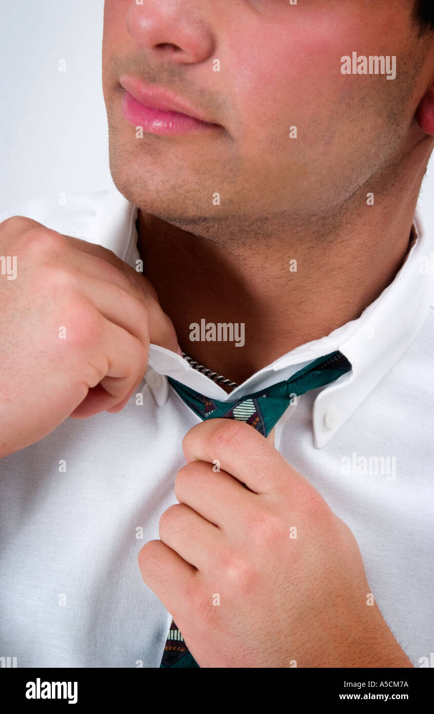 Loosening collar hi-res stock photography and images - Alamy
